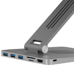 Side view of a silver laptop with an adjustable stand; left edge shows three USB-A 3.0 ports, an SD card slot, an HDMI port, and a USB-C port.