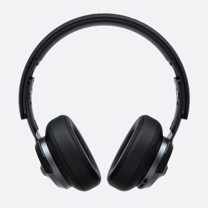Black over-ear headphones with cushioned ear cups on a light gray background.