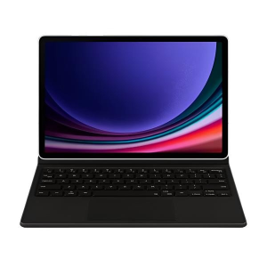 Black laptop opened, keyboard visible, screen showing a vibrant purple‑blue abstract wallpaper with curved lines.